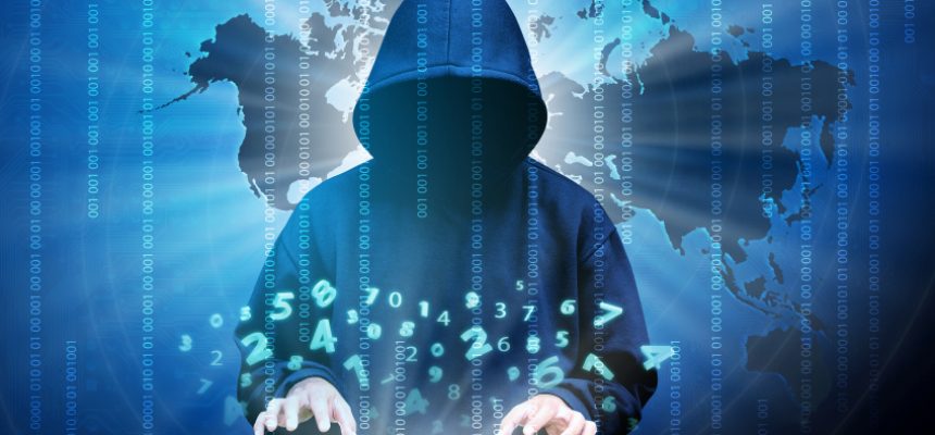 Computer hacker silhouette of hooded man with binary data and network security terms